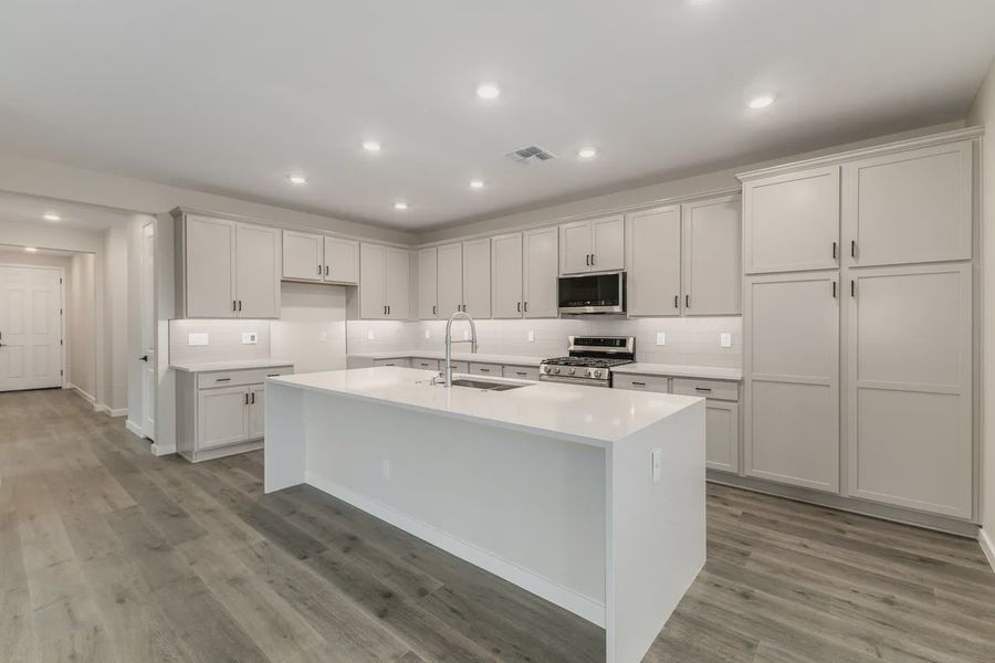 Furnished interior view inside a new home in Avanti at Granite Vista, Waddell (Image 9).