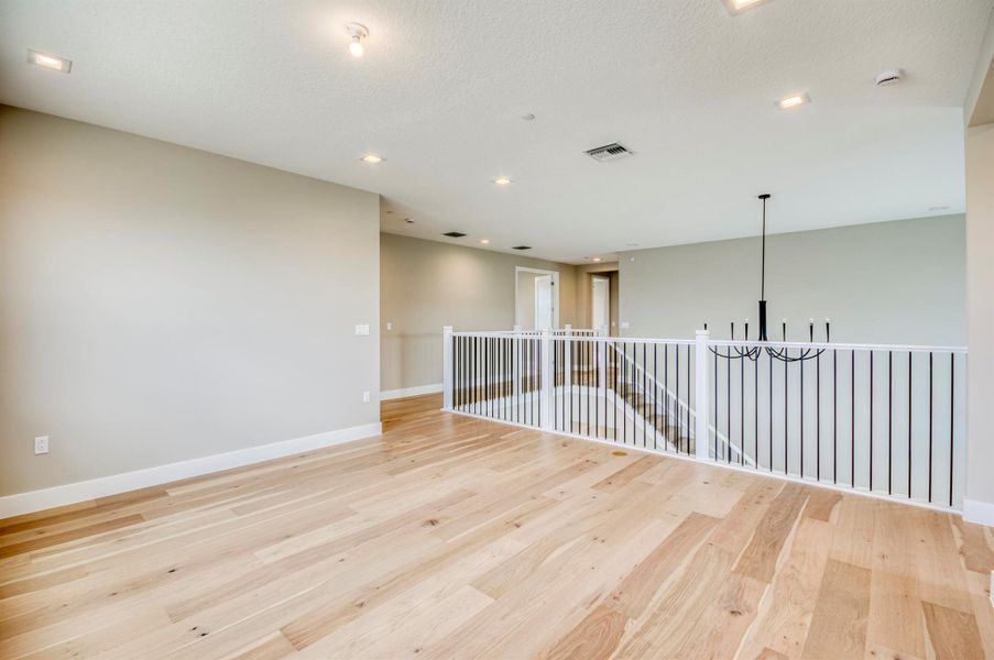 Furnished interior view inside a new home in Apex at Avenir, Palm Beach Gardens (Image 34).