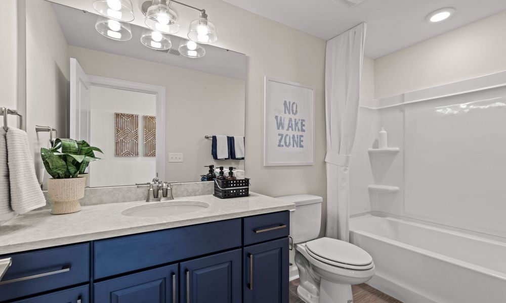 Representative furnished interior of a home built from the The Longboard by Chesapeake Homes in Bridgewater - Shorehaven Village, Little River (Image 42).