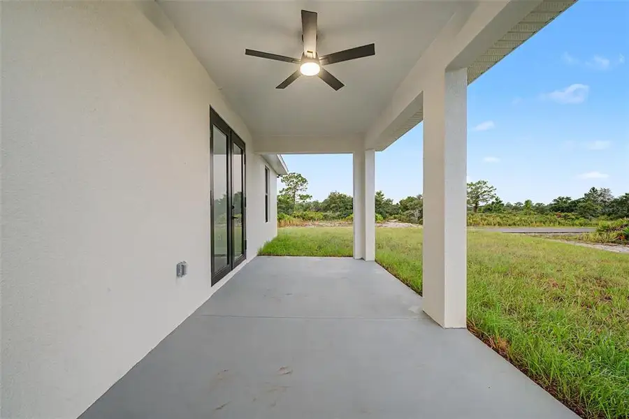 Exterior details and patio area of a home in , Sebring (Image 2). Exterior details and patio area of a home in , Sebring (Image 2).