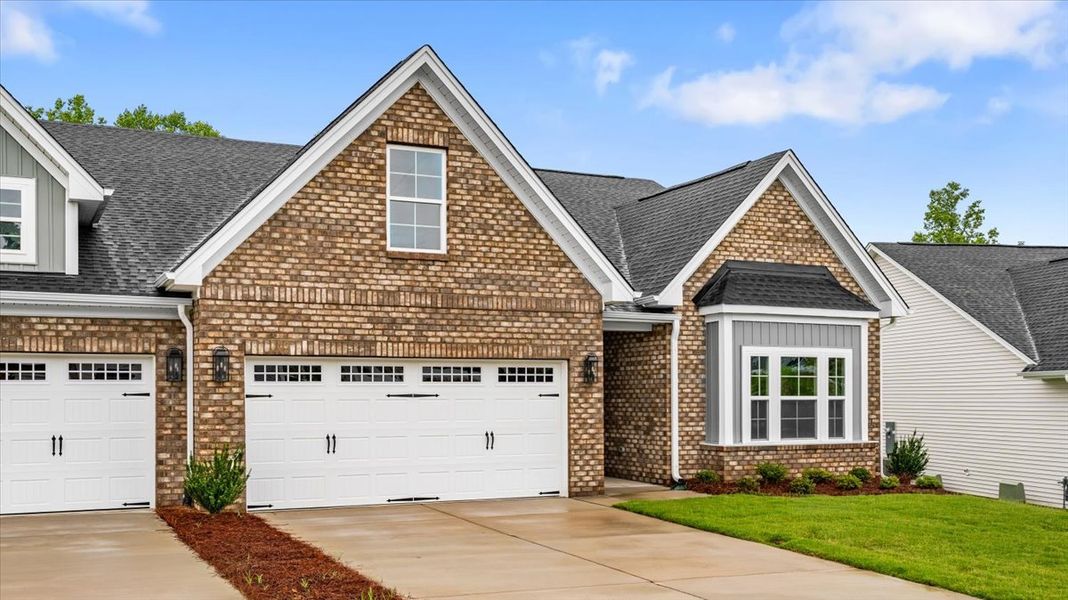 Front exterior of a new home in Fieldstone, Lexington, NC, highlighting curb appeal (Image 2). Front exterior of a new home in Fieldstone, Lexington, NC, highlighting curb appeal (Image 2).