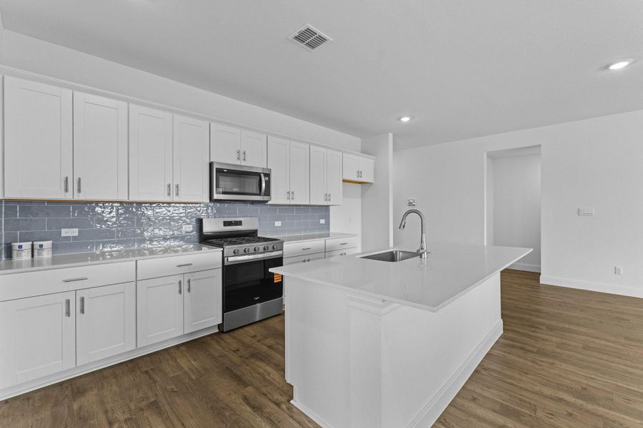 Furnished interior view inside a new home in Railhead, Cedar Creek (Image 7).