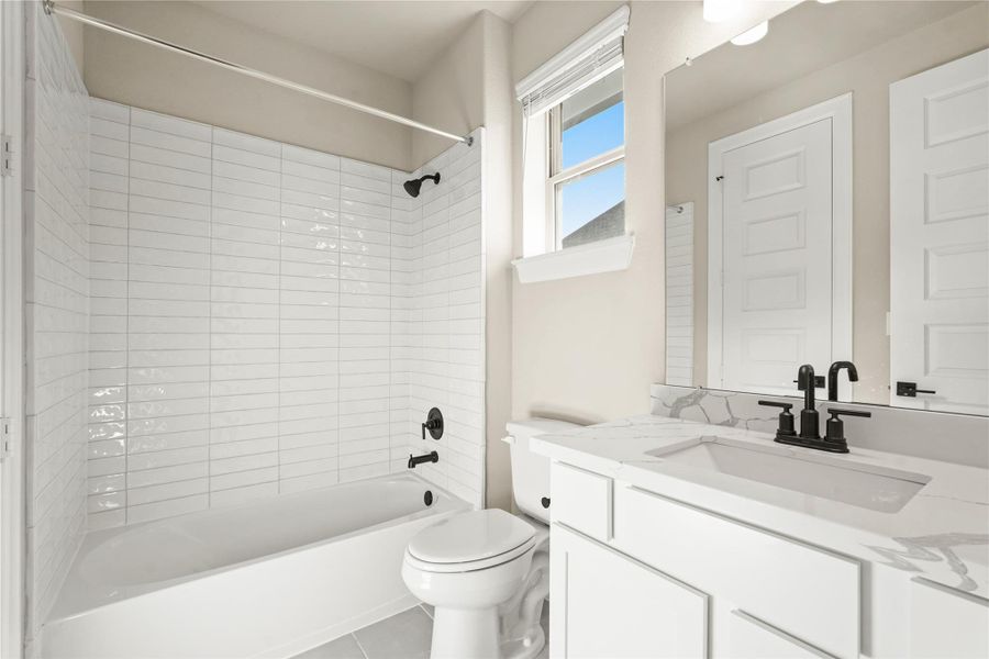 Furnished interior view inside a new home in Waterstone on Lake Conroe, Montgomery (Image 15).