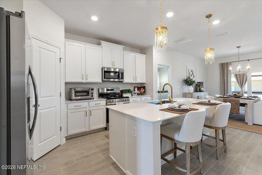 Furnished interior view inside a new home in Edenbrooke at Hyland Trail | 55+, Green Cove Springs (Image 6).