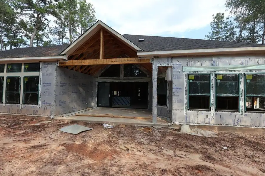Front exterior of a new home in The Woodlands Hills 70’, Willis, TX, highlighting curb appeal (Image 2).