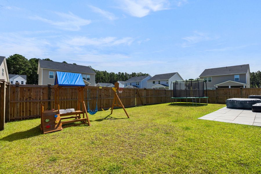 Front exterior of a new home in Sweetgrass at Summers Corner: Arbor Collection, Summerville, SC, highlighting curb appeal (Image 23). Front exterior of a new home in Sweetgrass at Summers Corner: Arbor Collection, Summerville, SC, highlighting curb appeal (Image 23).