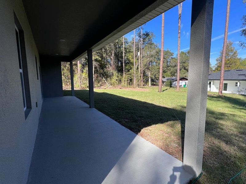 Exterior details and patio area of a home in , Citrus Springs (Image 22).