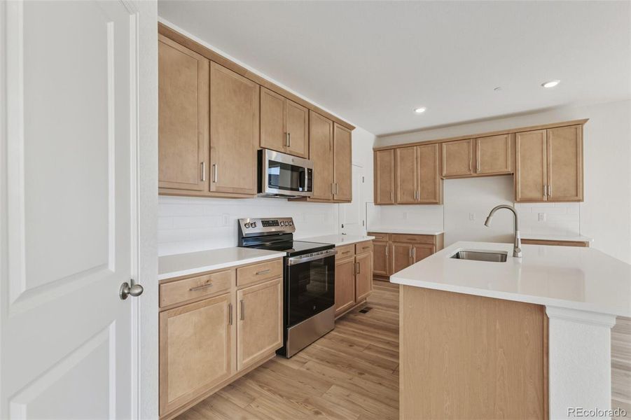 Furnished interior view inside a new home in Turnberry, Commerce City (Image 7).