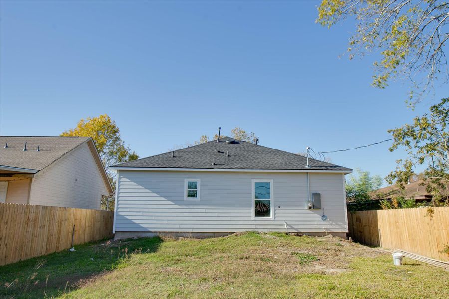 Exterior details and patio area of a home in , Houston (Image 3).