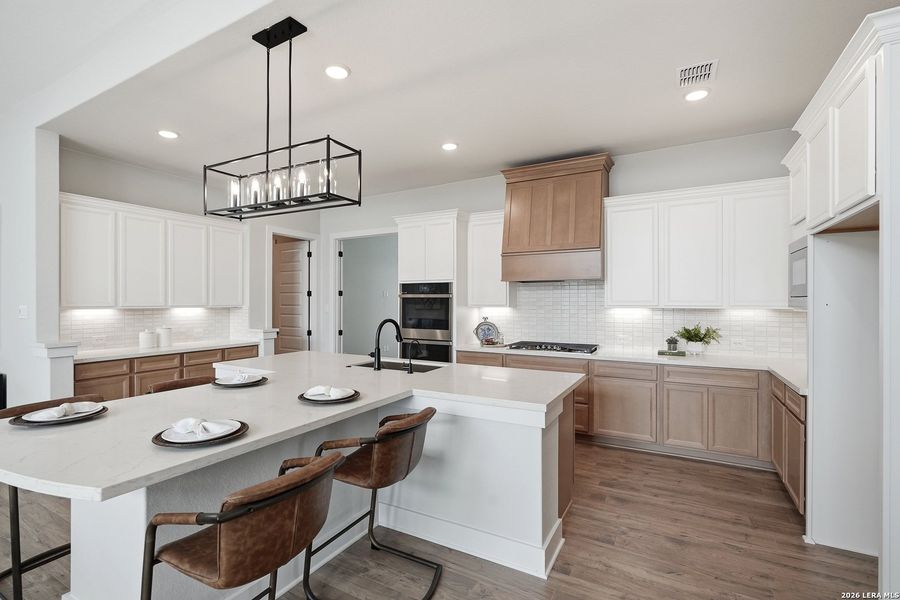 Furnished interior view inside a new home in Potranco Oaks, Castroville (Image 7).