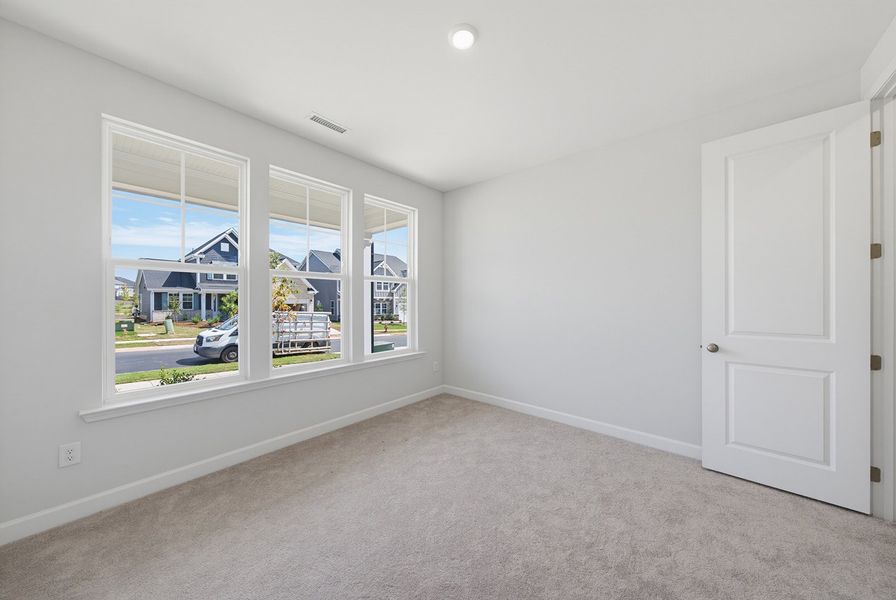 Spacious, unfurnished interior of a new home in Sweetbrier, Durham (Image 30).