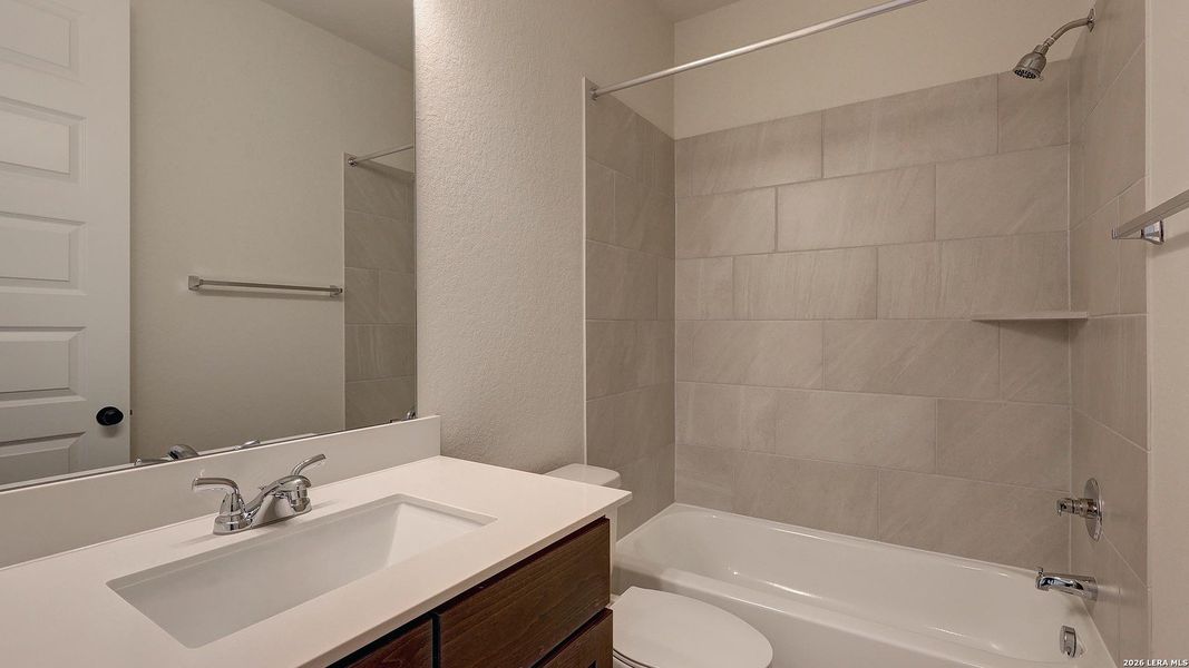 Furnished interior view inside a new home in Briggs Ranch, San Antonio (Image 15).