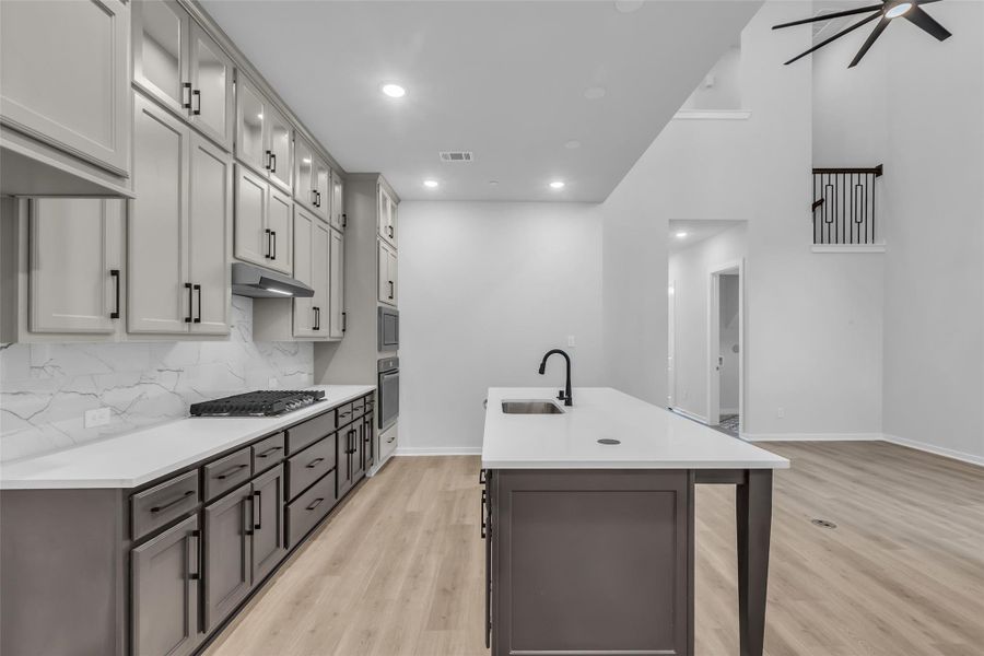 Enjoy a seamless flow from the kitchen into the family room.