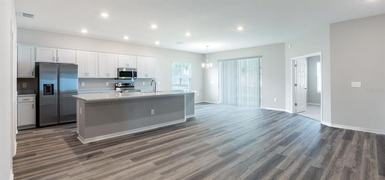 Furnished interior view inside a new home in Otter Woods Estates, Auburndale (Image 4).