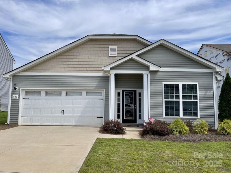 Front exterior of a new home in Pinnacle Estates, Shelby, NC, highlighting curb appeal (Image 1).