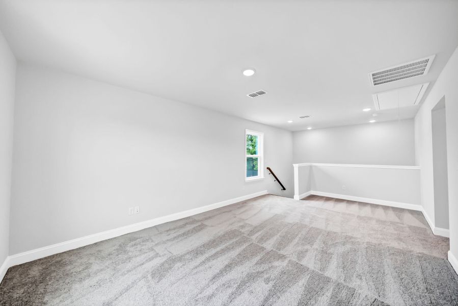 Spacious, unfurnished interior of a new home in Monroe Preserve, Chapin (Image 31).