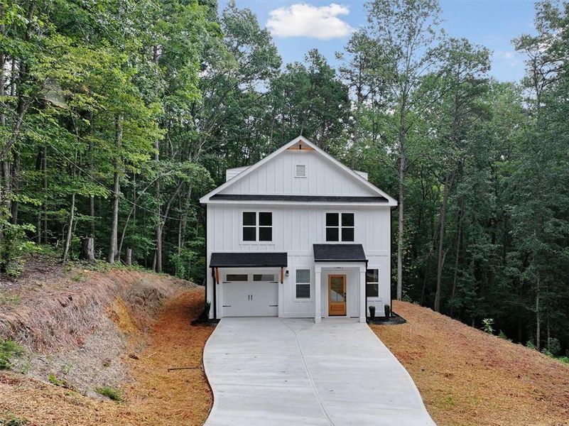 Front exterior of a new home in , Gainesville, GA, highlighting curb appeal (Image 18).