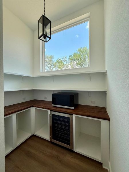 Fancy pantry with microwave and beverage fridge as well as a breathtaking window! Fancy pantry with microwave and beverage fridge as well as a breathtaking window!