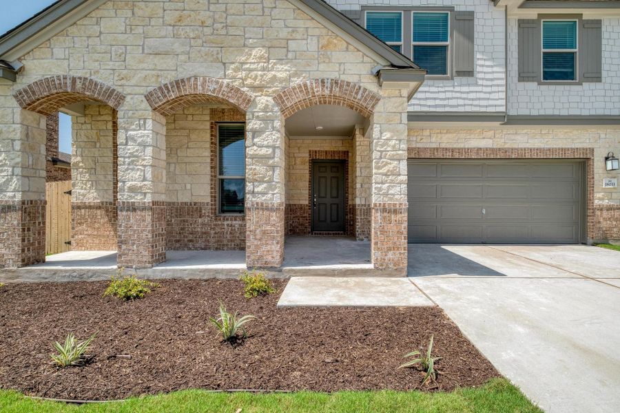 Exterior details and patio area of a home in Mustang Valley, Manor (Image 18). Exterior details and patio area of a home in Mustang Valley, Manor (Image 18).