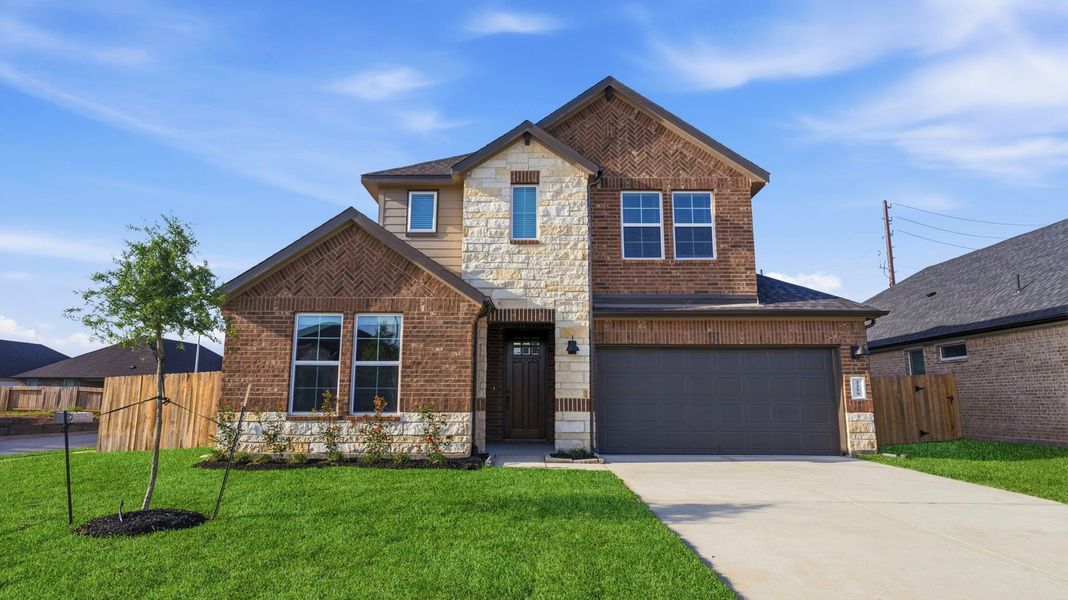 Representative exterior photo of a completed home built from the Rockdale by D.R. Horton in Alexander 55' Homesites, Pearland, TX (Image 2).