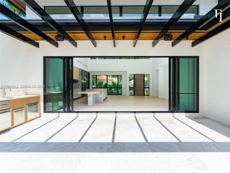 Exterior details and patio area of a home in , Coral Gables (Image 25). Exterior details and patio area of a home in , Coral Gables (Image 25).