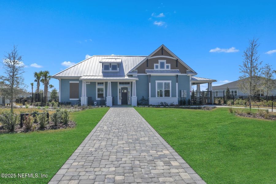 Front exterior of a new home in Everlake at Mandarin, Jacksonville, FL, highlighting curb appeal (Image 24).