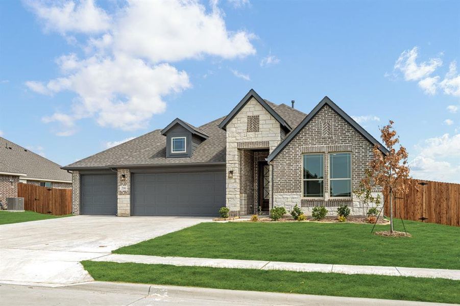 Front exterior of a new home in Waverly Estates, Josephine, TX, highlighting curb appeal (Image 1).