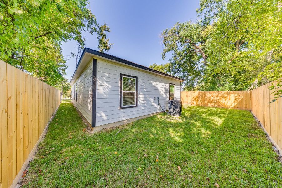 Exterior details and patio area of a home in , Houston (Image 16). Exterior details and patio area of a home in , Houston (Image 16).