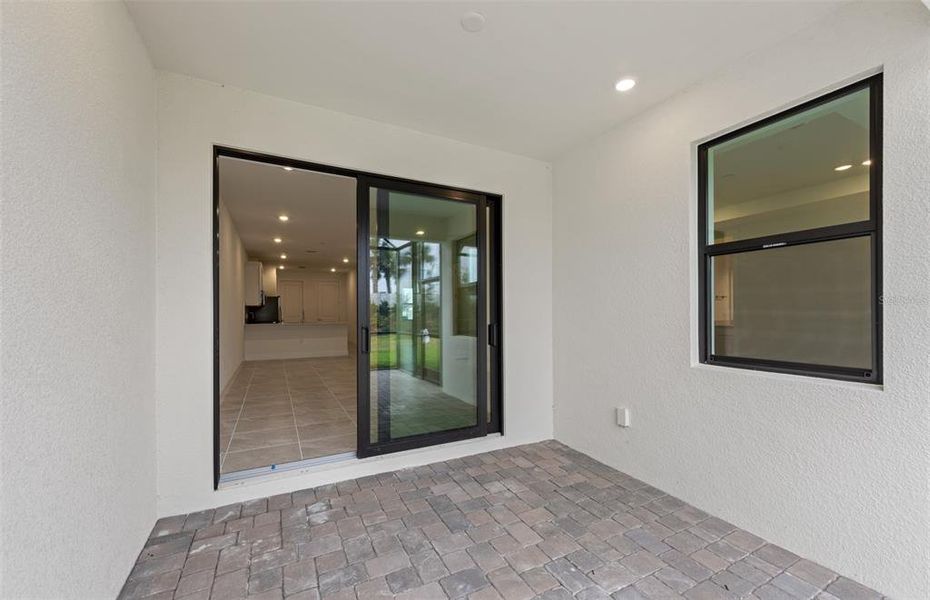 Exterior details and patio area of a home in Talon Preserve on Palmer Ranch, Nokomis (Image 22).