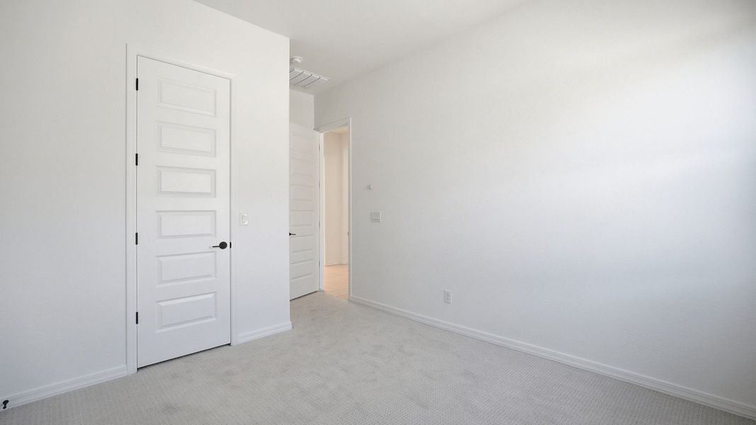 Furnished interior view inside a new home in Arroyo Seco - Palazzo, Buckeye (Image 9).