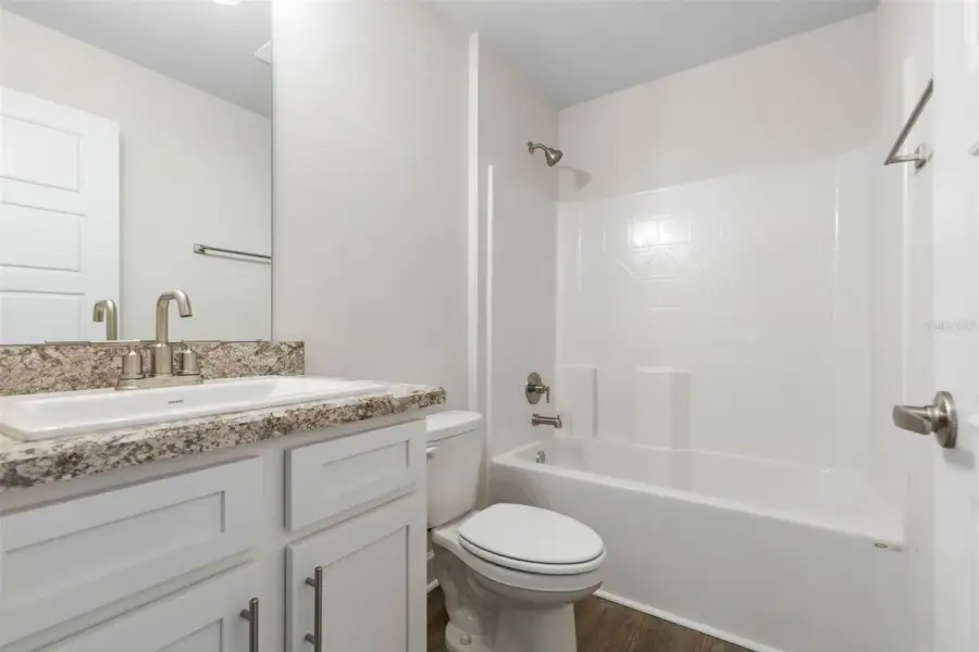 Representative furnished interior of a home built from the 2265 by Adams Homes in Flagler Estates, Hastings (Image 16).
