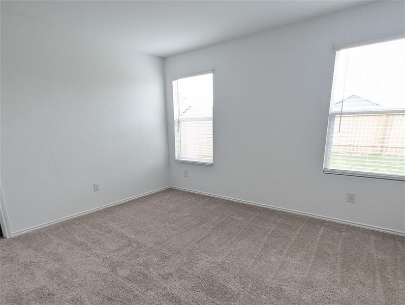 An inviting room offering a neutral canvas for your personal style and comfort.