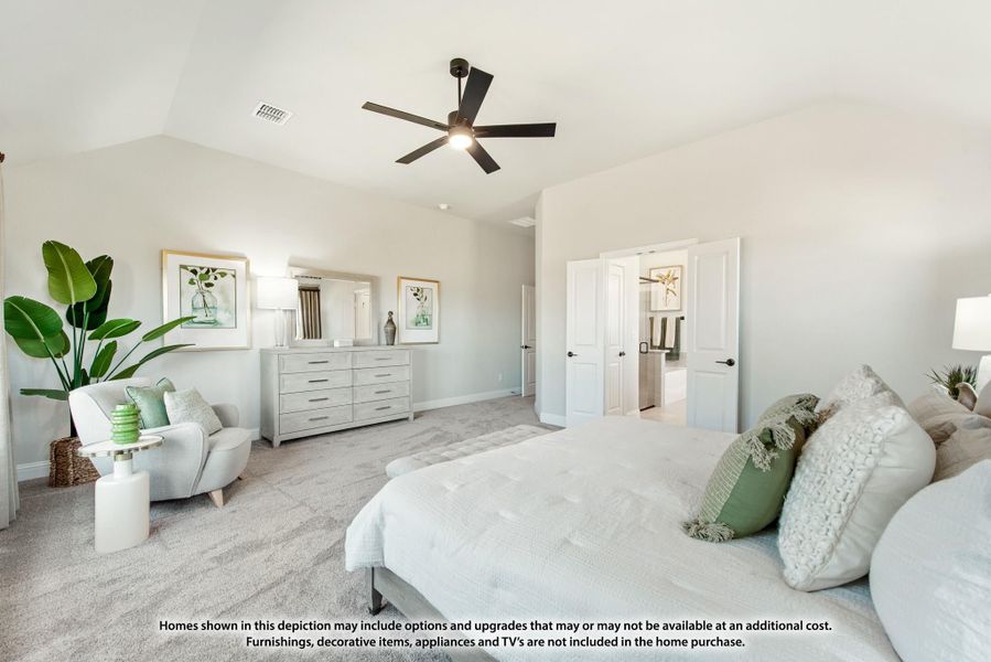 Spacious master bedroom with vaulted ceiling, ceiling fan, carpet flooring, and ensuite bathroom doorway. Spacious master bedroom with vaulted ceiling, ceiling fan, carpet flooring, and ensuite bathroom doorway.