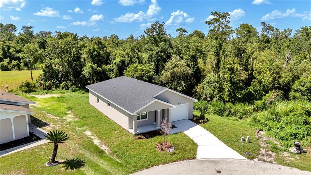 Front exterior of a new home in , Lakeland, FL, highlighting curb appeal (Image 19). Front exterior of a new home in , Lakeland, FL, highlighting curb appeal (Image 19).