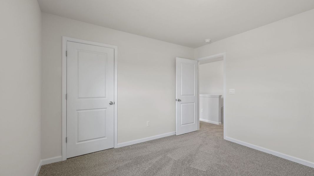 Spacious, unfurnished interior of a new home in Bentley Park, Greenwood (Image 21).
