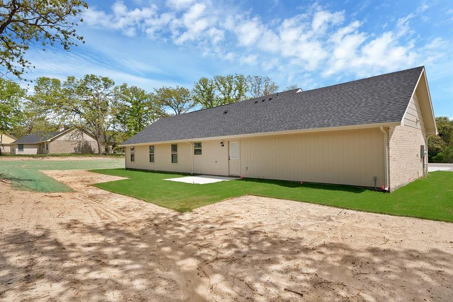 Exterior details and patio area of a home in , Poolville (Image 3).