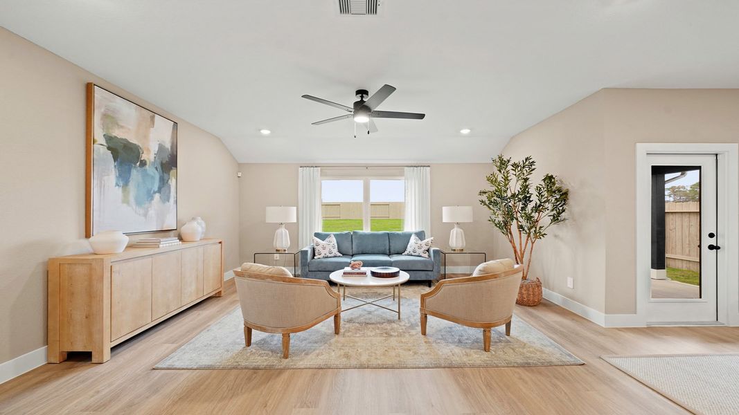 Representative furnished interior of a home built from the Texas Cali by D.R. Horton in Chapel Lakes, Montgomery (Image 11).