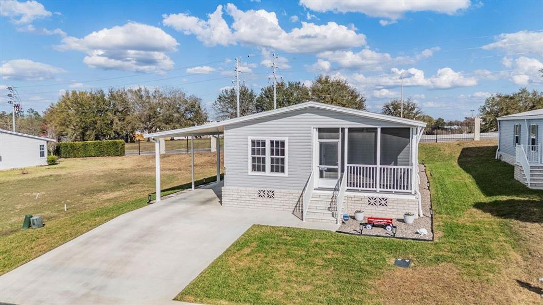 Exterior details and patio area of a home in , Zephyrhills (Image 22).