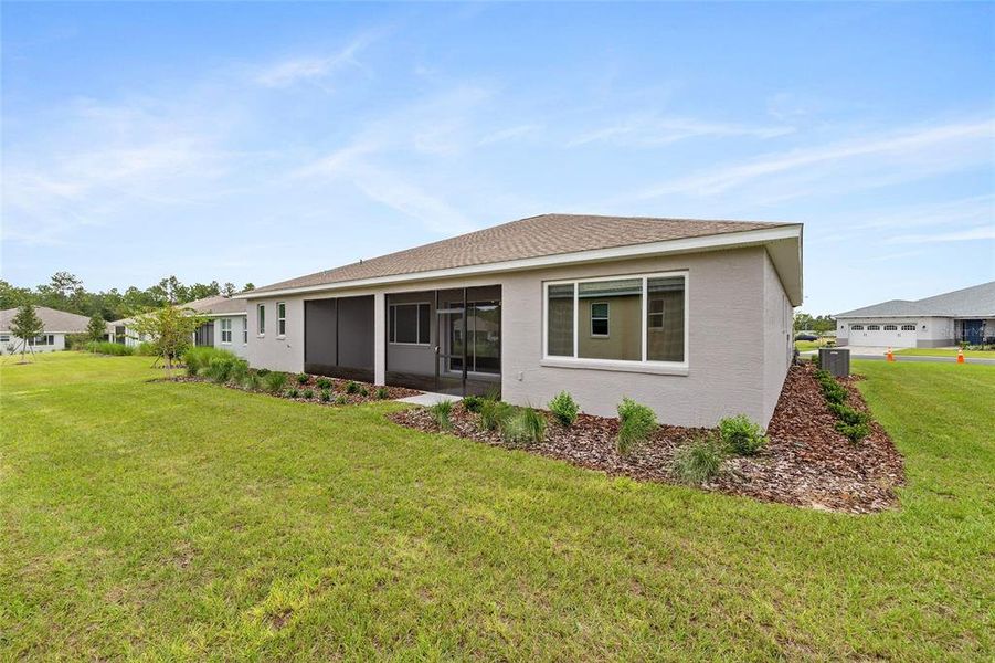 Exterior details and patio area of a home in On Top of the World Communities, Ocala (Image 18).