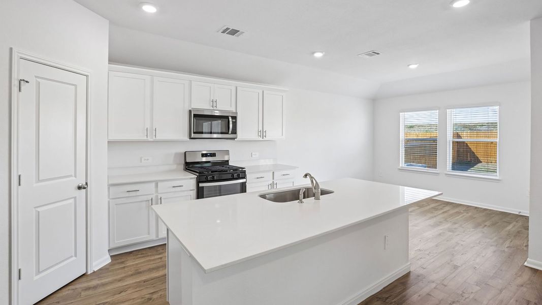Furnished interior view inside a new home in Prairie Lakes, Buda (Image 6).