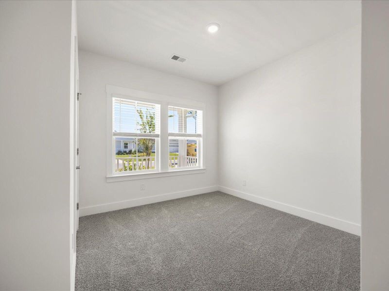 Spacious, unfurnished interior of a new home in The Coves at Lakes of Cane Bay, Summerville (Image 42). Spacious, unfurnished interior of a new home in The Coves at Lakes of Cane Bay, Summerville (Image 42).