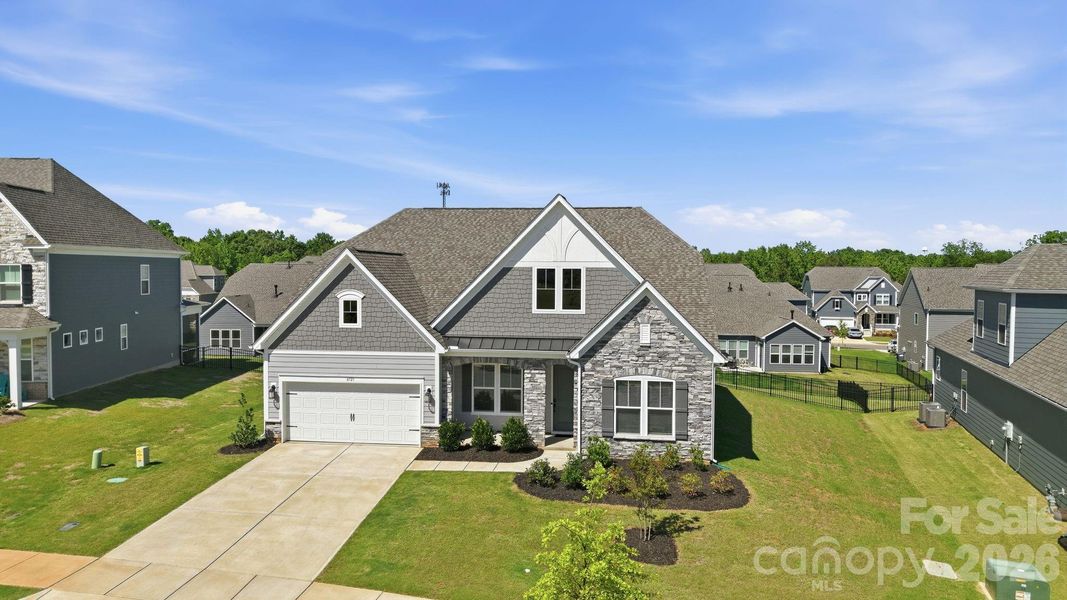 Front exterior of a new home in Estates at Sugar Creek, Indian Land, SC, highlighting curb appeal (Image 28).