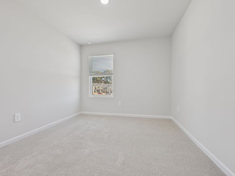 Spacious, unfurnished interior of a new home in The Rows at Buffaloe Reserve, Raleigh (Image 12).