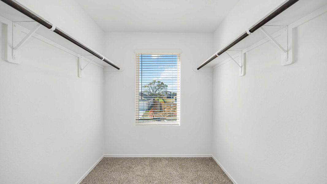 Representative unfurnished interior of a home built from the Franklin by D.R. Horton in Legacy Village, Houston (Image 12).