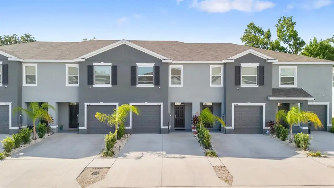 Front exterior of a new home in , Wimauma, FL, highlighting curb appeal (Image 1). Front exterior of a new home in , Wimauma, FL, highlighting curb appeal (Image 1).