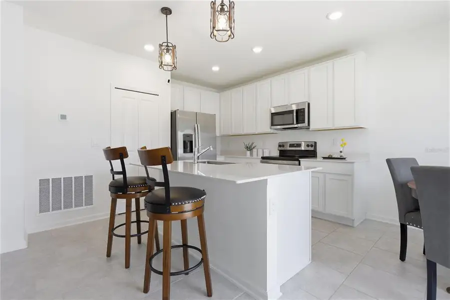 Furnished interior view inside a new home in Vineland Reserve, Osteen (Image 7).