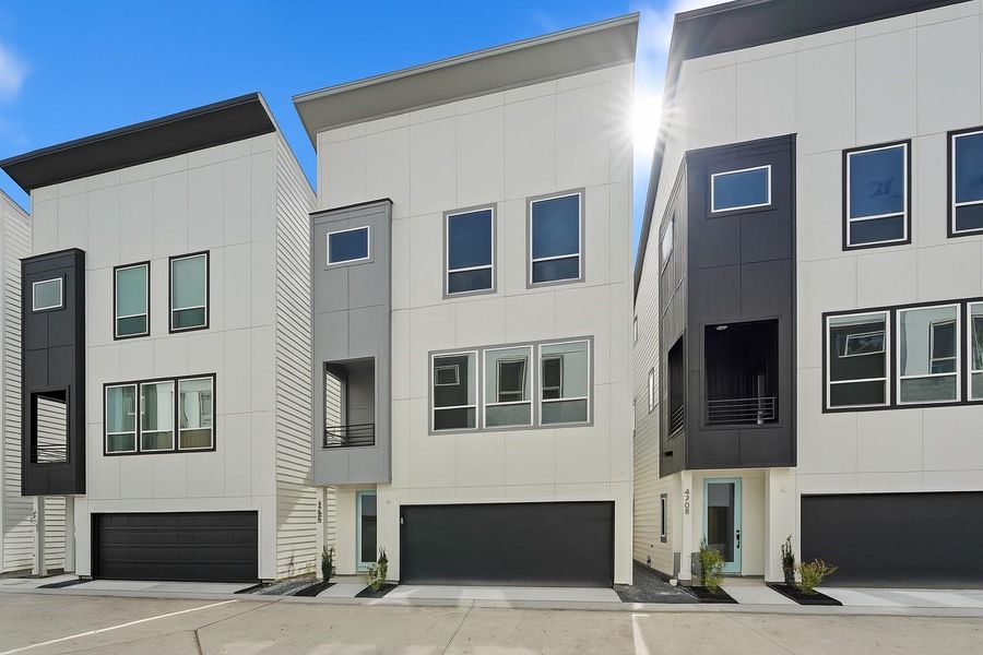 Front exterior of a new home in , Houston, TX, highlighting curb appeal (Image 1).
