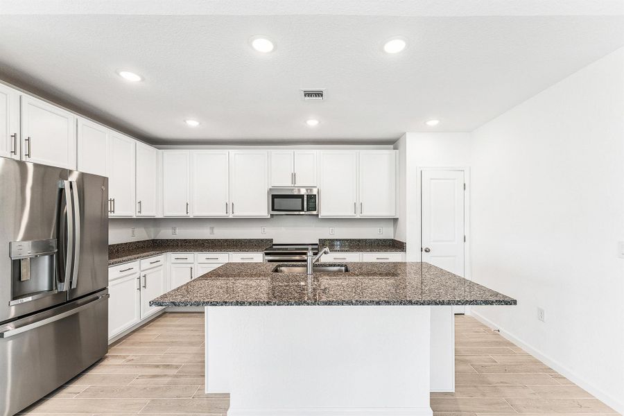 Furnished interior view inside a new home in , Port St. Lucie (Image 6).