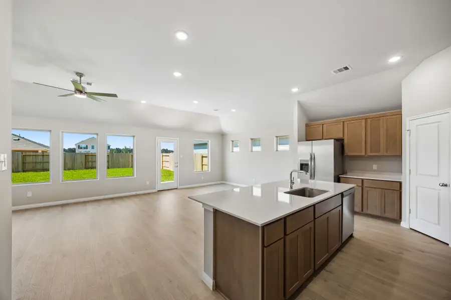 Kitchen in the Sabine home plan by Trophy Signature Homes – REPRESENTATIVE PHOTO Kitchen in the Sabine home plan by Trophy Signature Homes – REPRESENTATIVE PHOTO