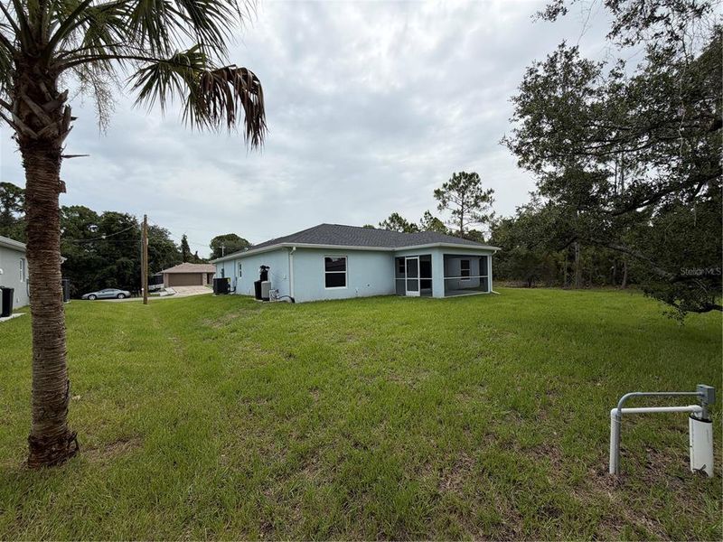 Exterior details and patio area of a home in , North Port (Image 23).
